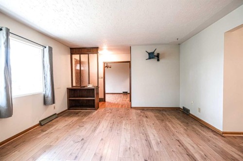 59 Rosewood Road Nw, Calgary, AB - Indoor Photo Showing Other Room