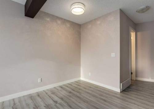 14 Pantego Lane Nw, Calgary, AB - Indoor Photo Showing Other Room