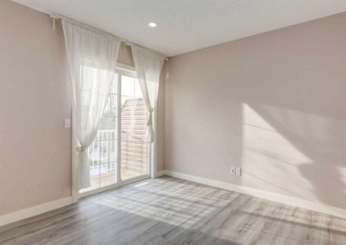 14 Pantego Lane Nw, Calgary, AB - Indoor Photo Showing Other Room
