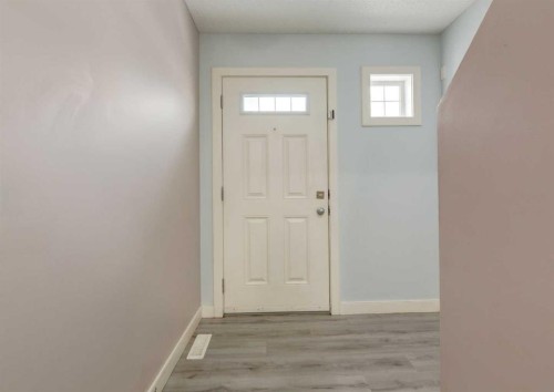 14 Pantego Lane Nw, Calgary, AB - Indoor Photo Showing Other Room