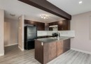14 Pantego Lane Nw, Calgary, AB  - Indoor Photo Showing Kitchen With Double Sink 