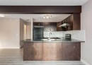 14 Pantego Lane Nw, Calgary, AB  - Indoor Photo Showing Kitchen With Double Sink 