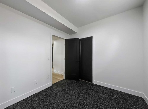 129 Sundown Place Se, Calgary, AB - Indoor Photo Showing Other Room