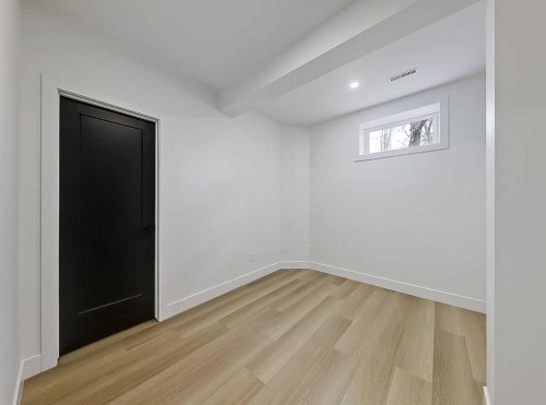 129 Sundown Place Se, Calgary, AB - Indoor Photo Showing Other Room