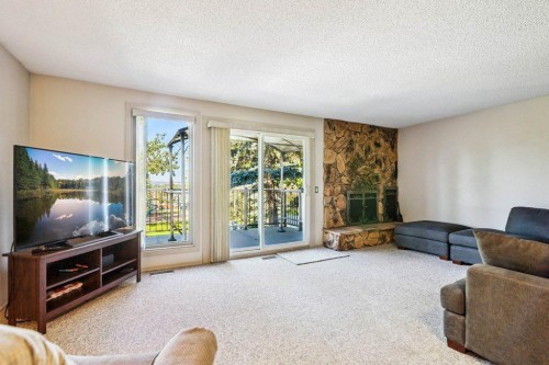 153 Mckinnon Crescent Ne, Calgary, AB - Indoor Photo Showing Living Room