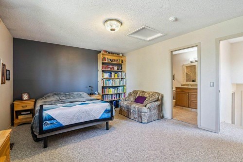 153 Mckinnon Crescent Ne, Calgary, AB - Indoor Photo Showing Bedroom