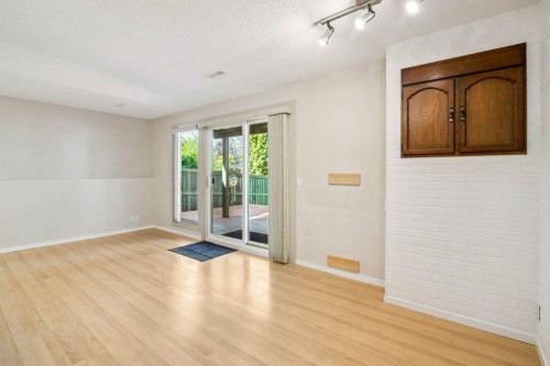 153 Mckinnon Crescent Ne, Calgary, AB - Indoor Photo Showing Other Room