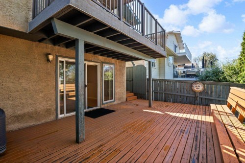 153 Mckinnon Crescent Ne, Calgary, AB - Outdoor With Deck Patio Veranda With Exterior