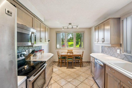 153 Mckinnon Crescent Ne, Calgary, AB - Indoor Photo Showing Kitchen