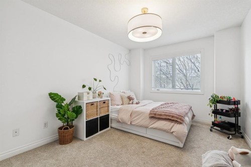 155 Somme Manor Sw, Calgary, AB - Indoor Photo Showing Bedroom