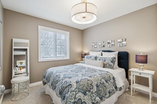 155 Somme Manor Sw, Calgary, AB - Indoor Photo Showing Bedroom