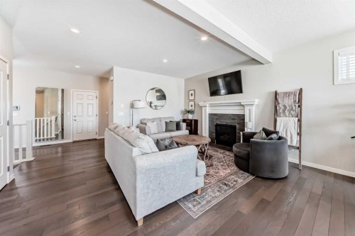 35 Walden Mount Se, Calgary, AB - Indoor Photo Showing Living Room With Fireplace