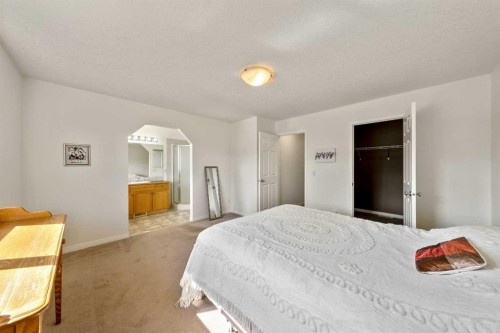 1211 Everridge Drive Sw, Calgary, AB - Indoor Photo Showing Bedroom