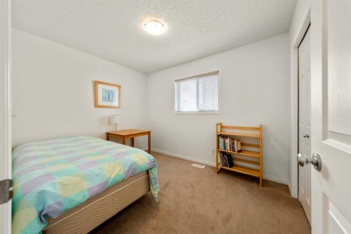 1211 Everridge Drive Sw, Calgary, AB - Indoor Photo Showing Bedroom
