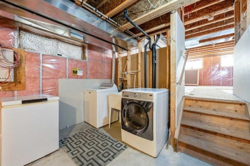1211 Everridge Drive Sw, Calgary, AB - Indoor Photo Showing Laundry Room