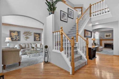 129 Bridlecreek Green Sw, Calgary, AB - Indoor With Fireplace