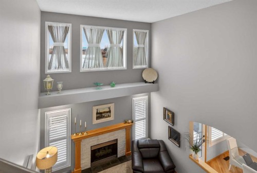 129 Bridlecreek Green Sw, Calgary, AB - Indoor With Fireplace