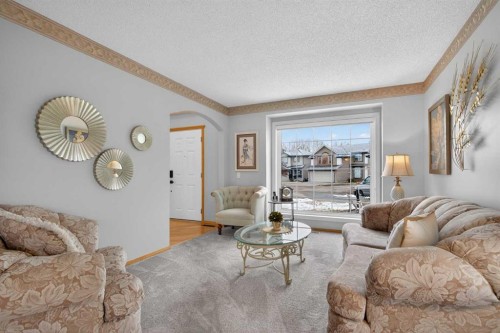 129 Bridlecreek Green Sw, Calgary, AB - Indoor Photo Showing Living Room