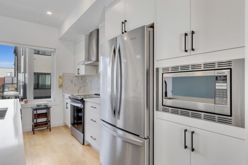 171 Greenbriar Place Nw, Calgary, AB - Indoor Photo Showing Kitchen With Stainless Steel Kitchen With Upgraded Kitchen