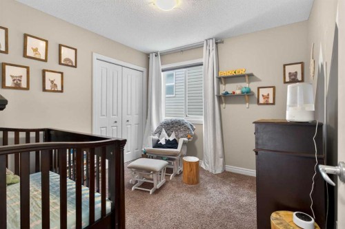 61 Sage Valley Manor Nw, Calgary, AB - Indoor Photo Showing Bedroom