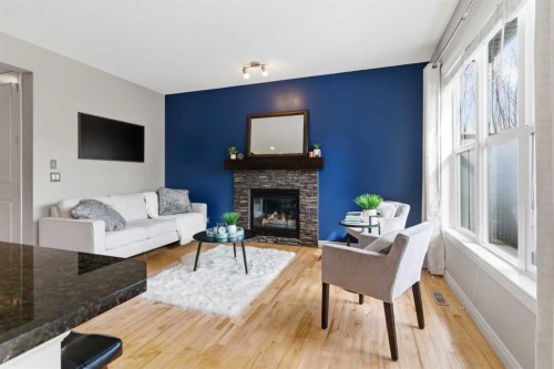 61 Sage Valley Manor Nw, Calgary, AB - Indoor Photo Showing Living Room With Fireplace