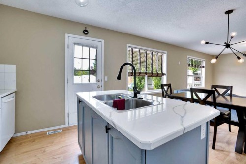 356 Chaparral Drive Se, Calgary, AB - Indoor Photo Showing Kitchen With Double Sink