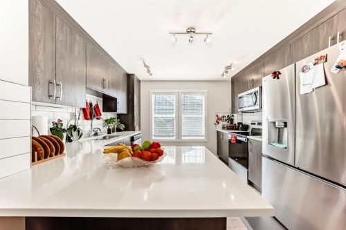 206 Cranbrook Square Se, Calgary, AB - Indoor Photo Showing Kitchen With Upgraded Kitchen