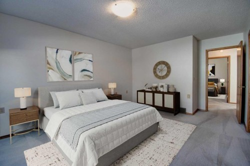 273 Woodside Road Nw, Airdrie, AB - Indoor Photo Showing Bedroom