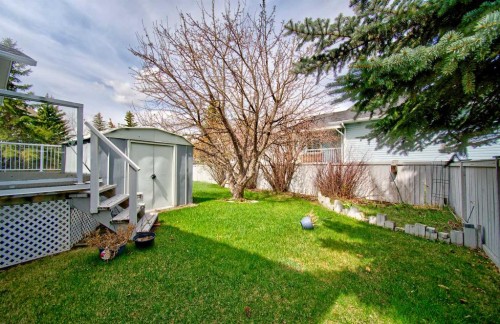 273 Woodside Road Nw, Airdrie, AB - Outdoor With Deck Patio Veranda