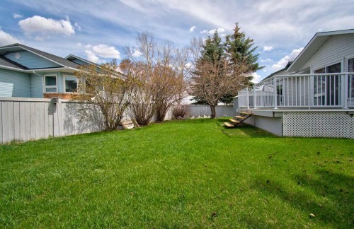 273 Woodside Road Nw, Airdrie, AB - Outdoor With Deck Patio Veranda