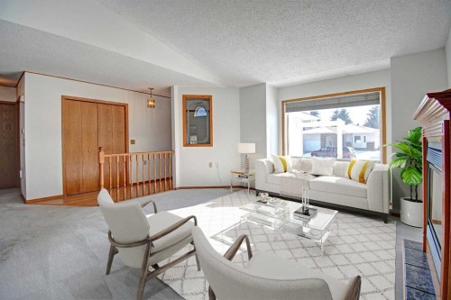 273 Woodside Road Nw, Airdrie, AB - Indoor Photo Showing Living Room
