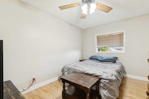 37 Ranch Glen Drive Nw, Calgary, AB - Indoor Photo Showing Bedroom