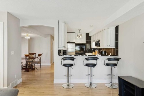 37 Ranch Glen Drive Nw, Calgary, AB - Indoor Photo Showing Kitchen With Double Sink