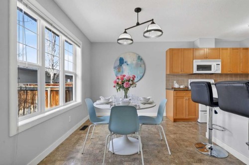 150 Everridge Common Sw, Calgary, AB - Indoor Photo Showing Dining Room