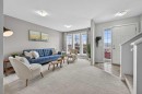 150 Everridge Common Sw, Calgary, AB  - Indoor Photo Showing Living Room 