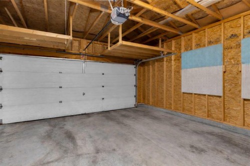 6 Douglas Woods Bay Se, Calgary, AB - Indoor Photo Showing Garage