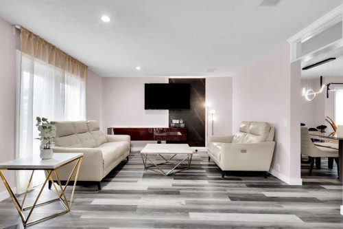 6 Douglas Woods Bay Se, Calgary, AB - Indoor Photo Showing Living Room