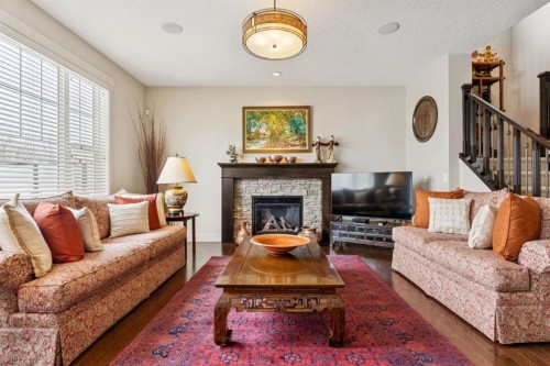 62 Ascot Crescent Sw, Calgary, AB - Indoor Photo Showing Living Room With Fireplace