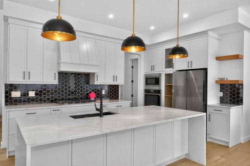 1049 Waterstone Green, Chestermere, AB - Indoor Photo Showing Kitchen With Upgraded Kitchen