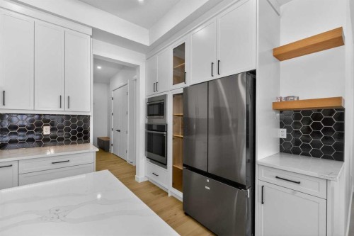 1049 Waterstone Green, Chestermere, AB - Indoor Photo Showing Kitchen