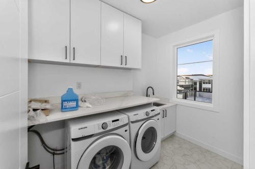 1049 Waterstone Green, Chestermere, AB - Indoor Photo Showing Laundry Room