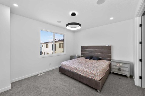 1049 Waterstone Green, Chestermere, AB - Indoor Photo Showing Bedroom
