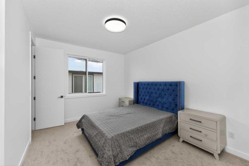 1049 Waterstone Green, Chestermere, AB - Indoor Photo Showing Bedroom