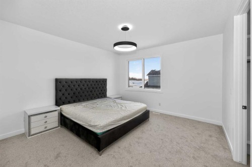1049 Waterstone Green, Chestermere, AB - Indoor Photo Showing Bedroom