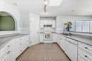 22 Applestone Park Se, Calgary, AB  - Indoor Photo Showing Kitchen With Double Sink 