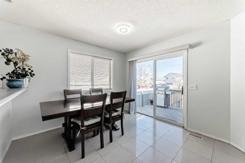 22 Applestone Park Se, Calgary, AB - Indoor Photo Showing Dining Room