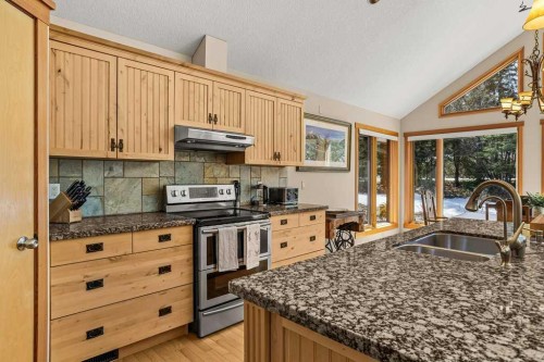108 Casale Place, Canmore, AB - Indoor Photo Showing Kitchen With Double Sink