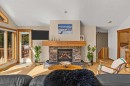 108 Casale Place, Canmore, AB  - Indoor Photo Showing Living Room With Fireplace 
