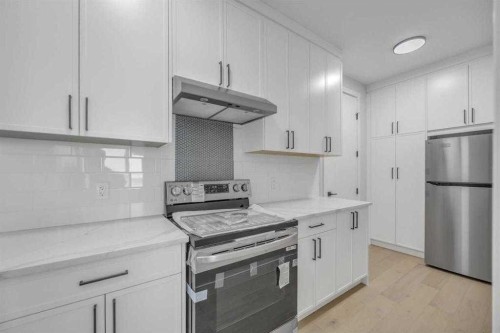 384 Watercrest Place, Chestermere, AB - Indoor Photo Showing Kitchen