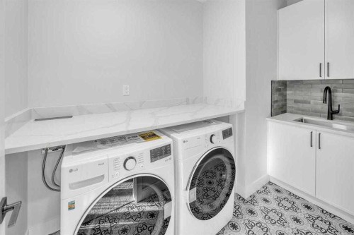 384 Watercrest Place, Chestermere, AB - Indoor Photo Showing Laundry Room